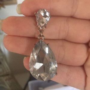 Silver chandelier earring pair.